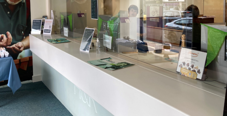 Photograph of the inside of Hinckley & Rugby Building Society branch.